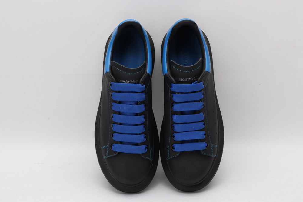 AMQ black oversized sneakers with blue heel