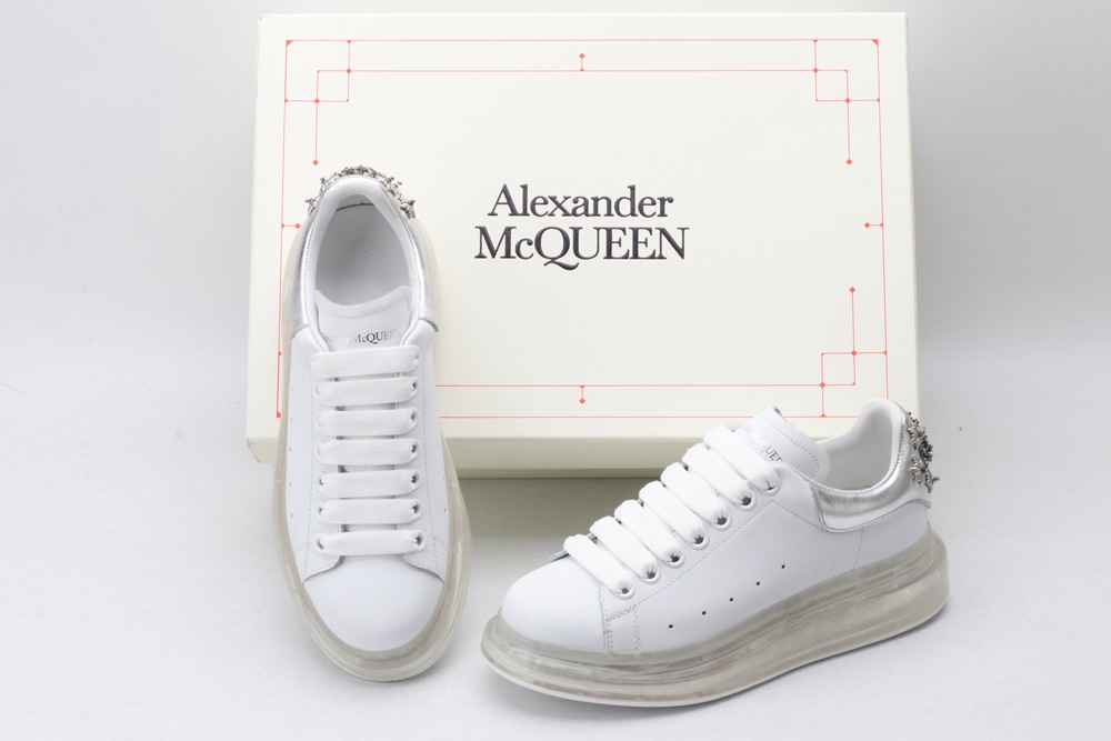 AMQ white oversized sneakers with siL*Ver heel