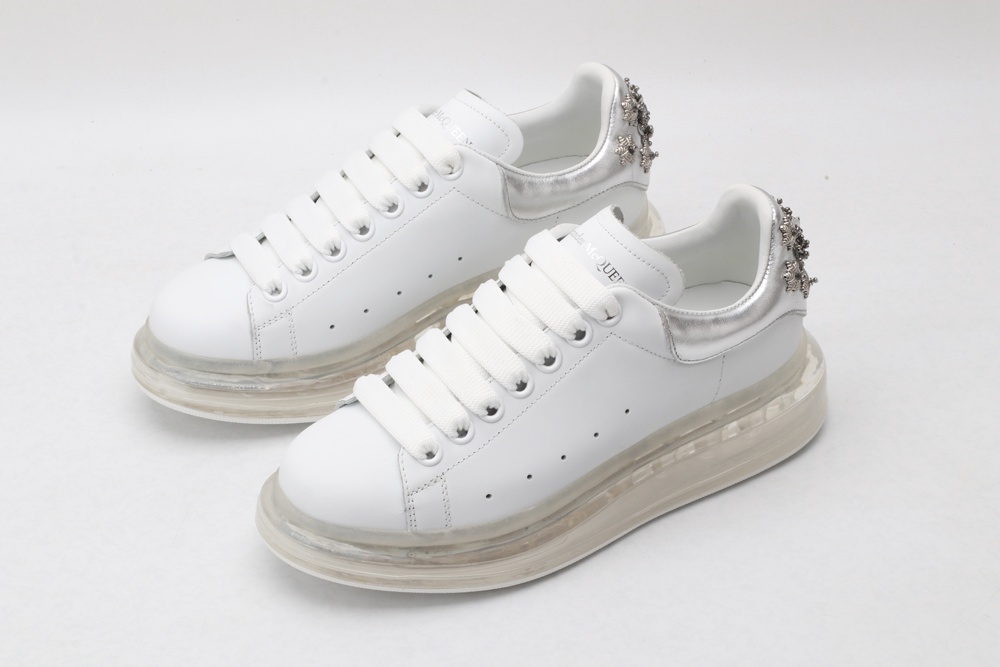 AMQ white oversized sneakers with siL*Ver heel