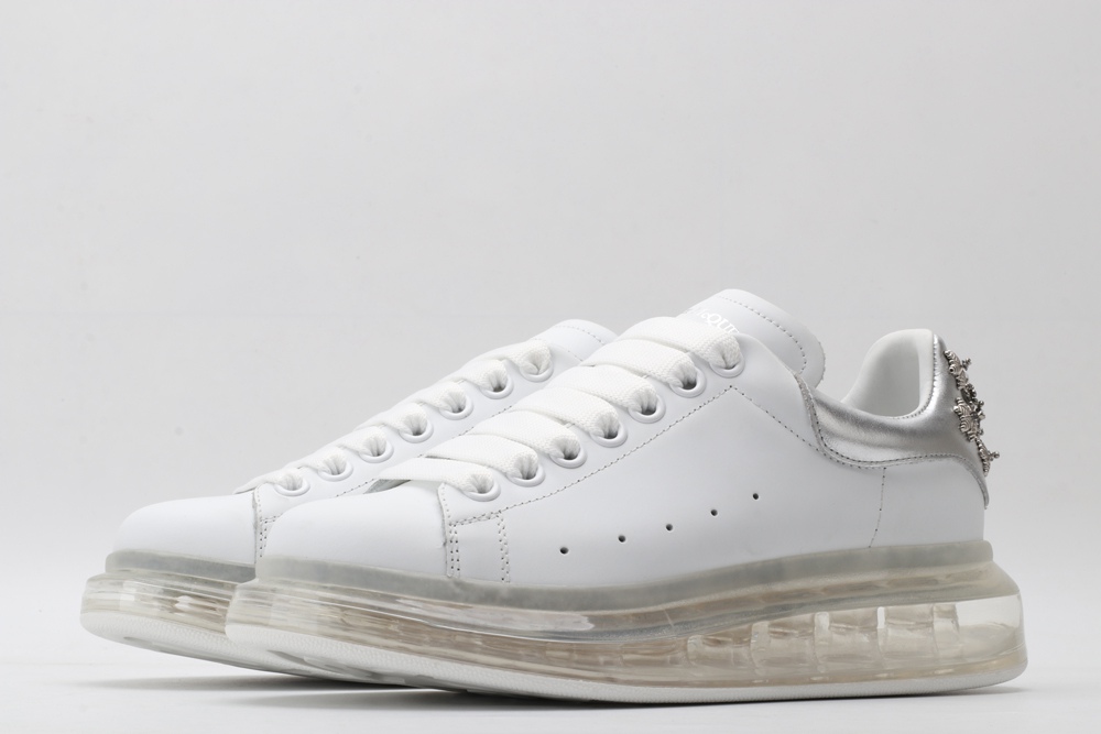 AMQ white oversized sneakers with siL*Ver heel