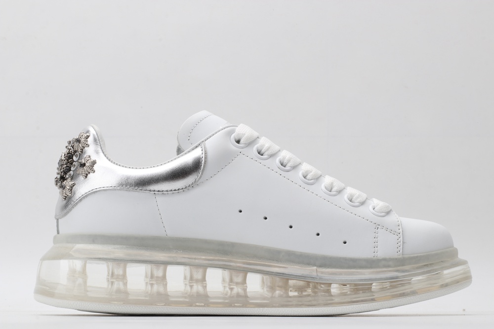 AMQ white oversized sneakers with siL*Ver heel