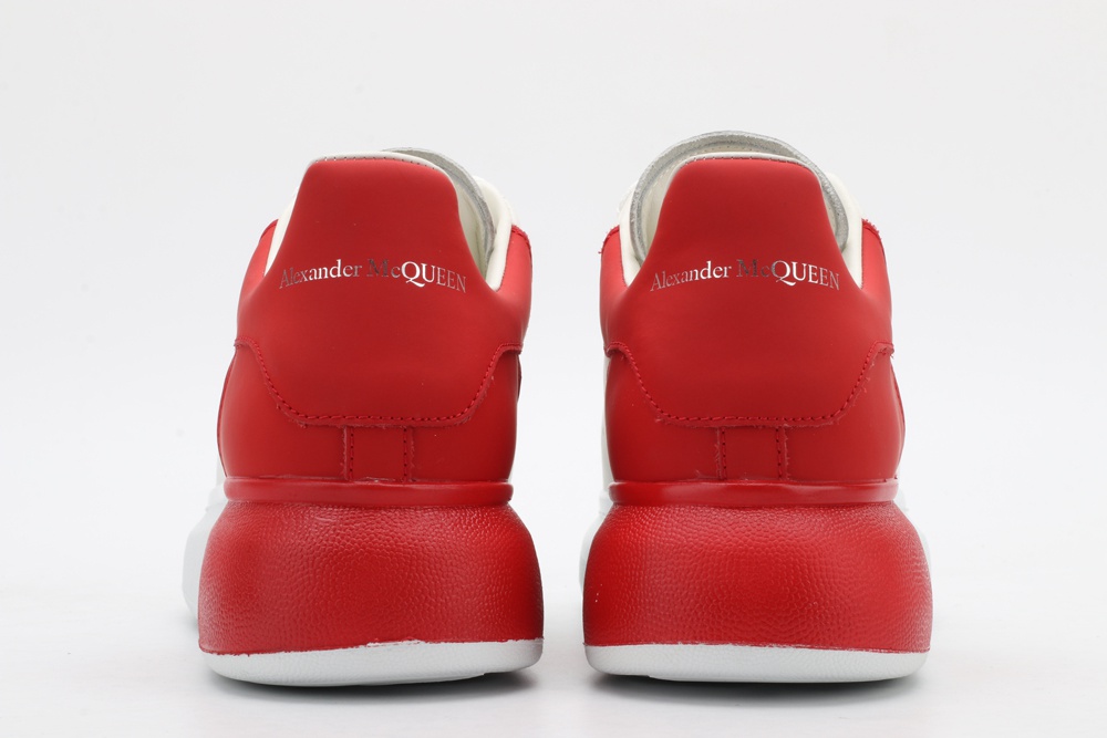 AMQ oversized sneakers with red heel