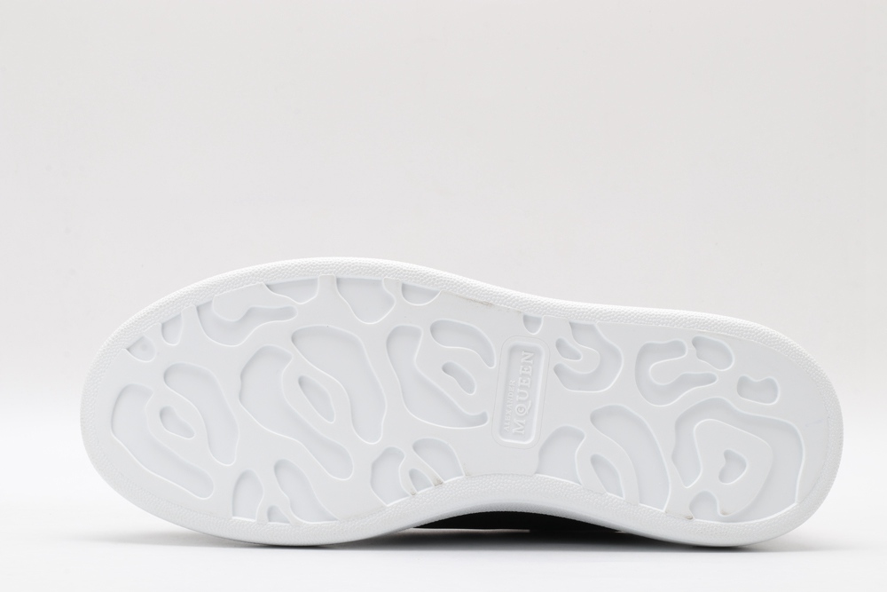 AMQ oversized black sneakers with rose heel