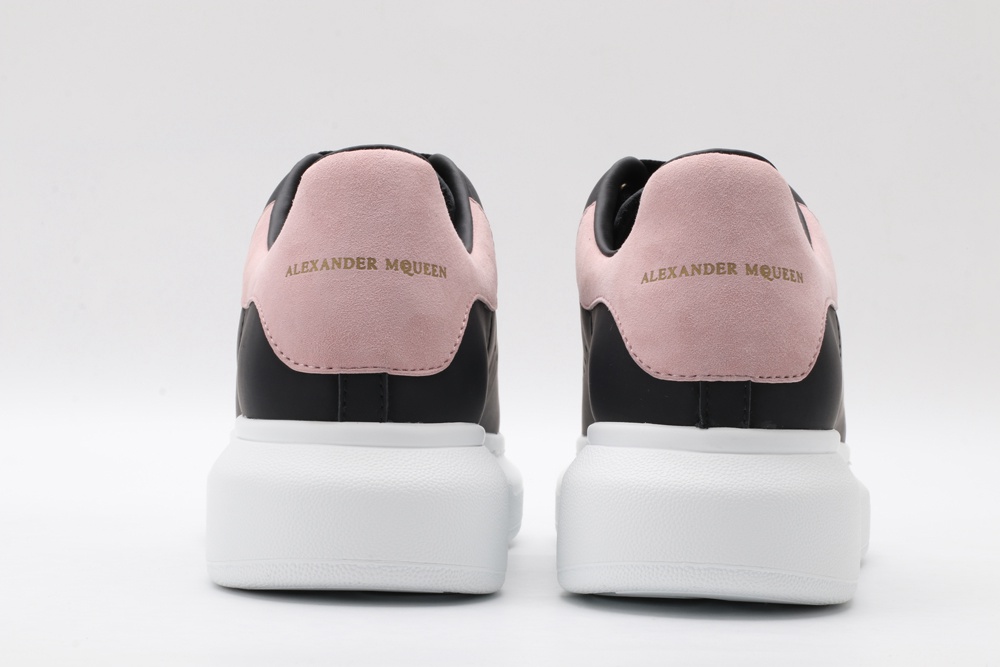 AMQ oversized black sneakers with rose heel