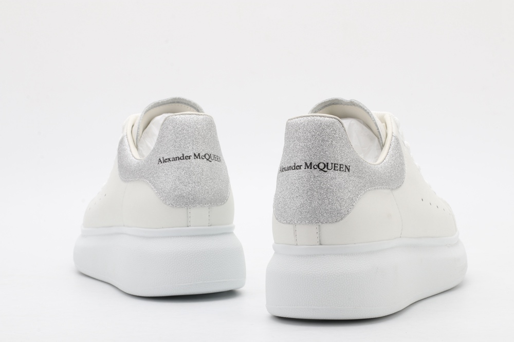 AMQ oversized sneakers with siL*Ver heel