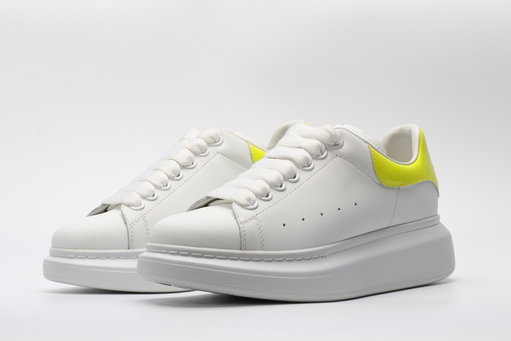 AMQ yellow foil embellished chunky leather sneakers