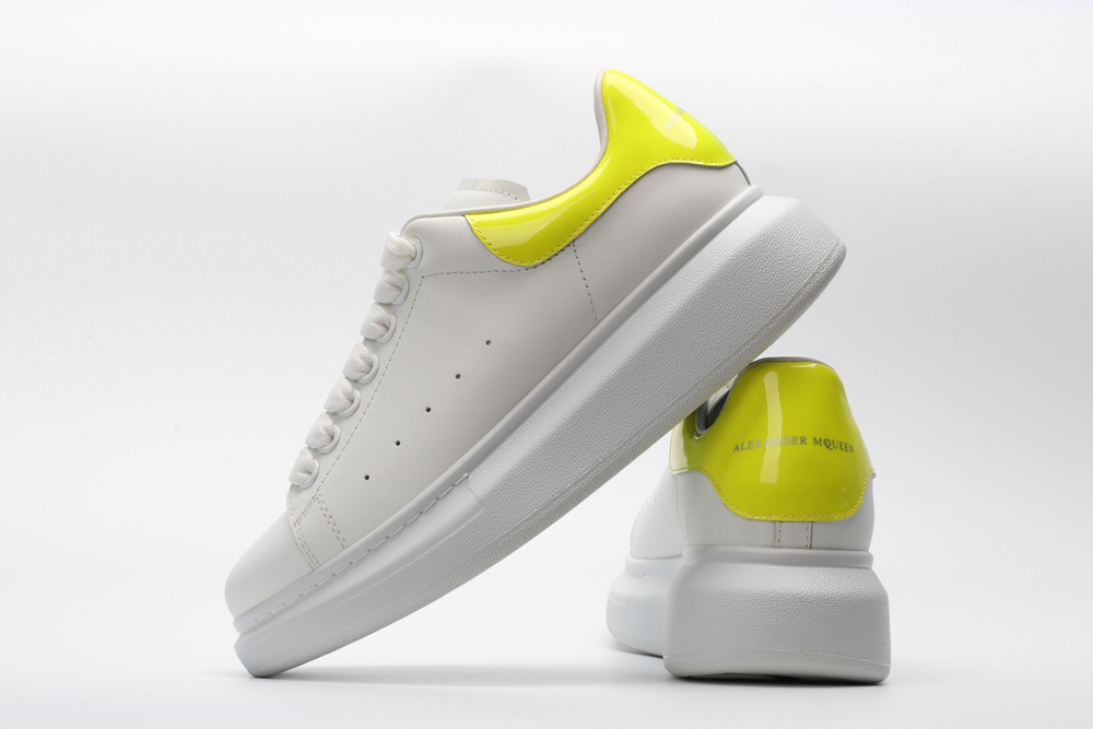 AMQ yellow foil embellished chunky leather sneakers