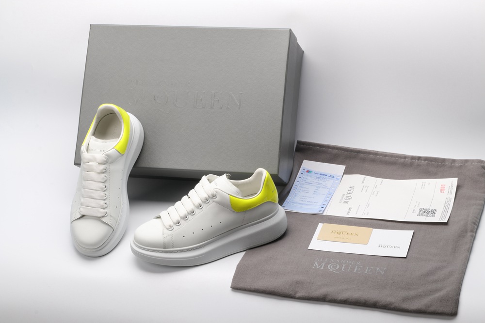 AMQ yellow foil embellished chunky leather sneakers