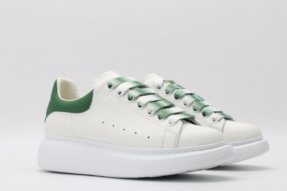 AMQ oversized sneakers with green heel