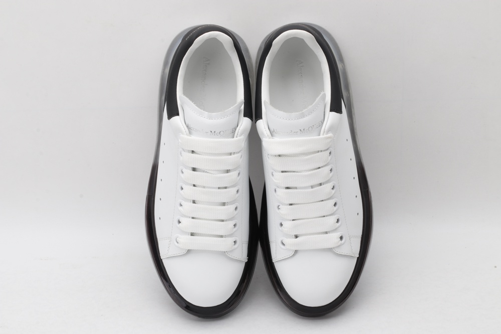 AMQ white oversized sneakers with black heel