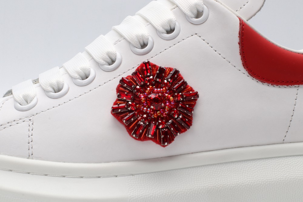 AMQ oversized sneakers with red heel