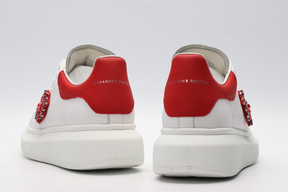 AMQ oversized sneakers with red heel