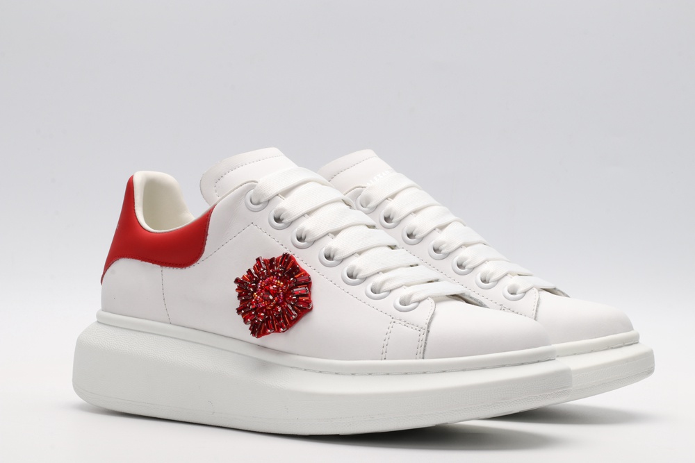 AMQ oversized sneakers with red heel