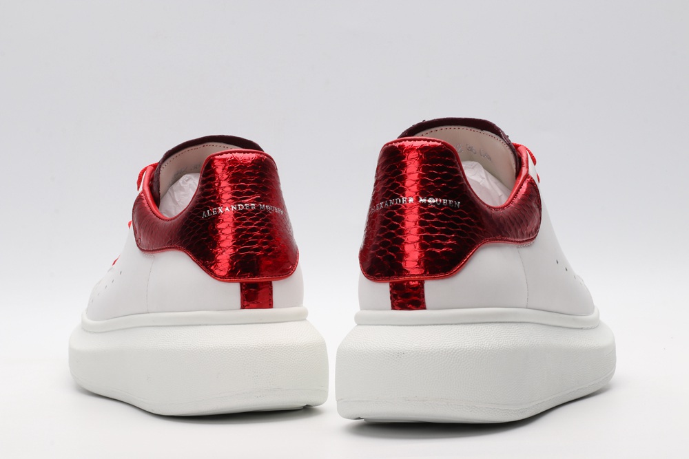 AMQ oversized sneakers with red heel