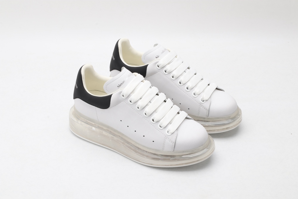 AMQ white oversized sneakers with black heel