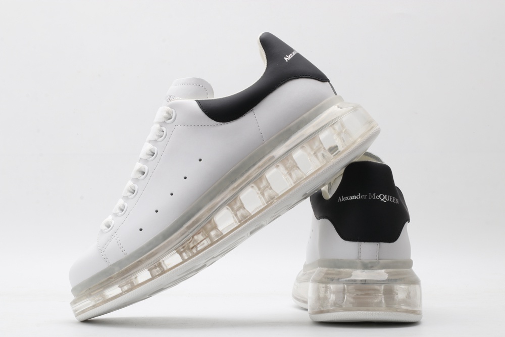 AMQ white oversized sneakers with black heel