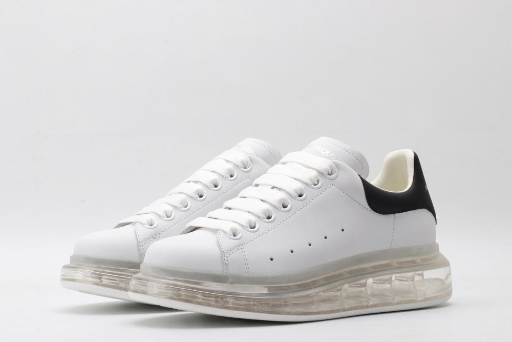 AMQ white oversized sneakers with black heel