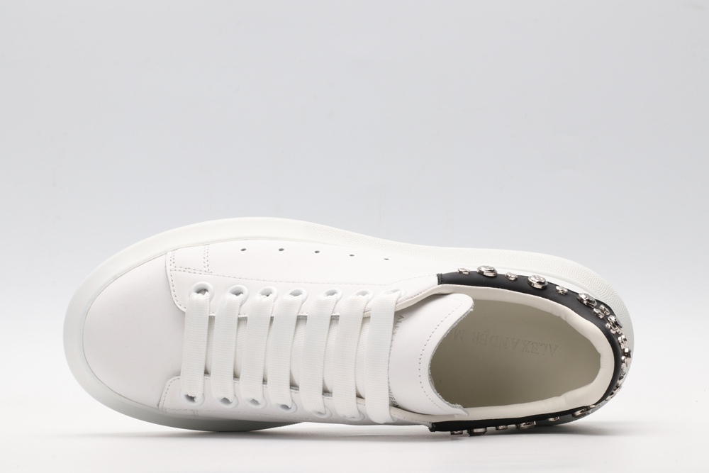 White calf leather lace-up sneaker trimmed with contrasting-color black calf leather heel