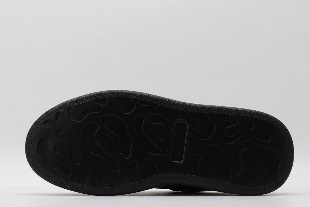 AMQ oversized sneakers black with gold heel