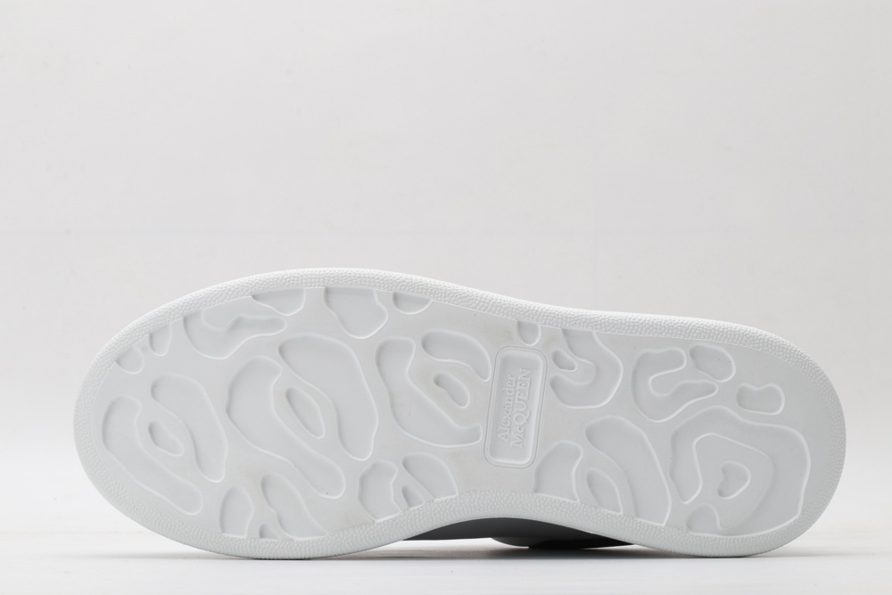 AMQ white oversized sneakers with black heel