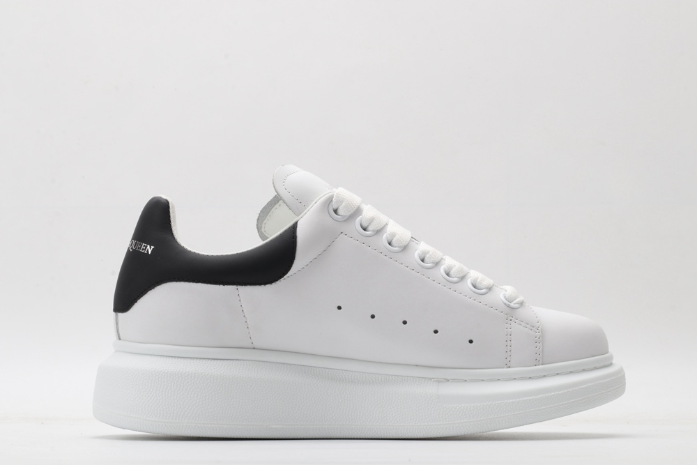 AMQ white oversized sneakers with black heel
