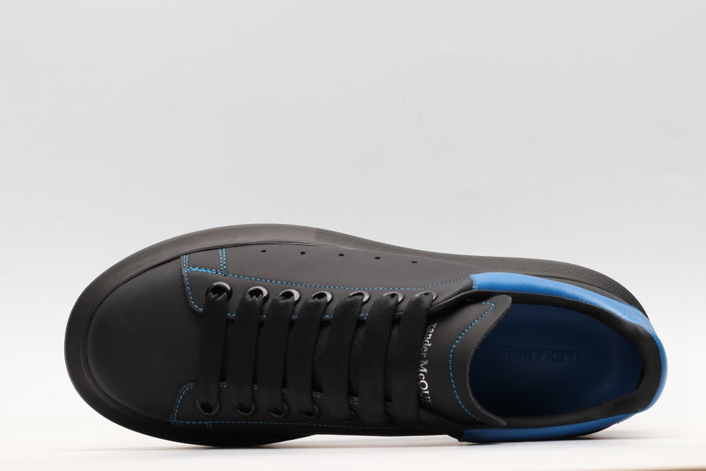 AMQ black oversized sneakers with blue heel