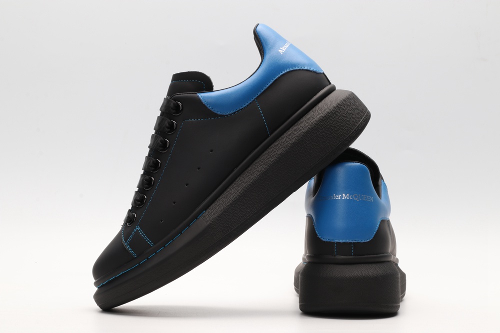 AMQ black oversized sneakers with blue heel