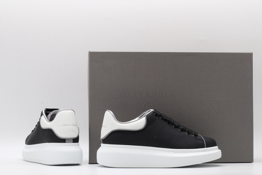 AMQ oversized black sneakers with white heel