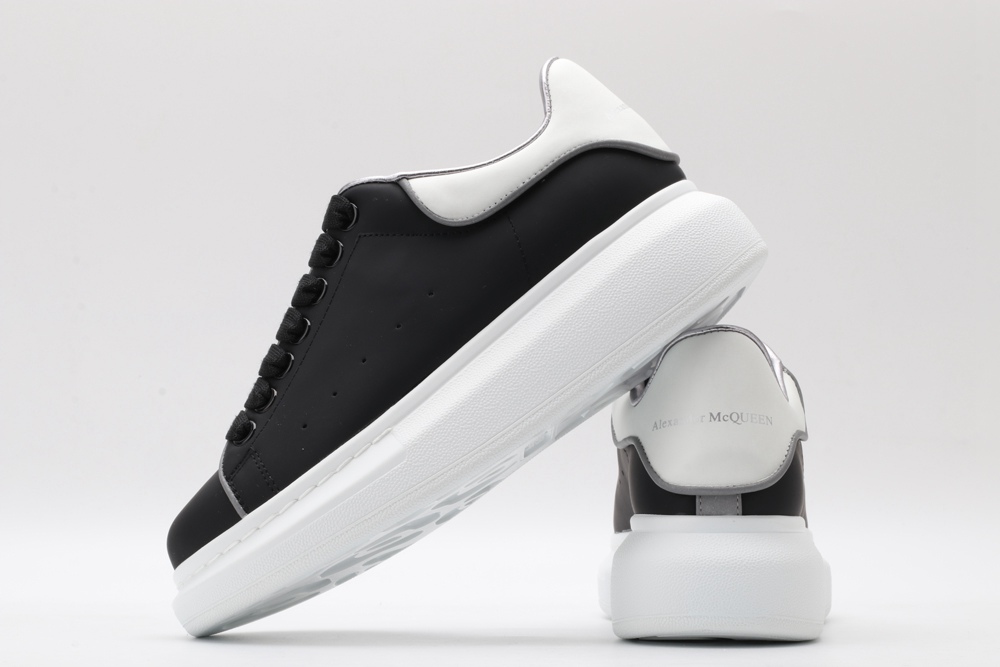 AMQ oversized black sneakers with white heel