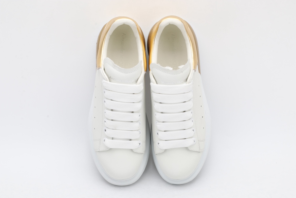 AMQ oversized sneakers with gold heel
