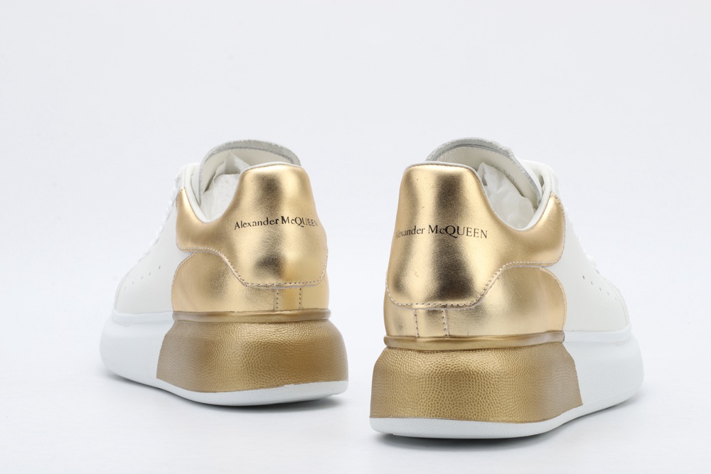 AMQ oversized sneakers with gold heel
