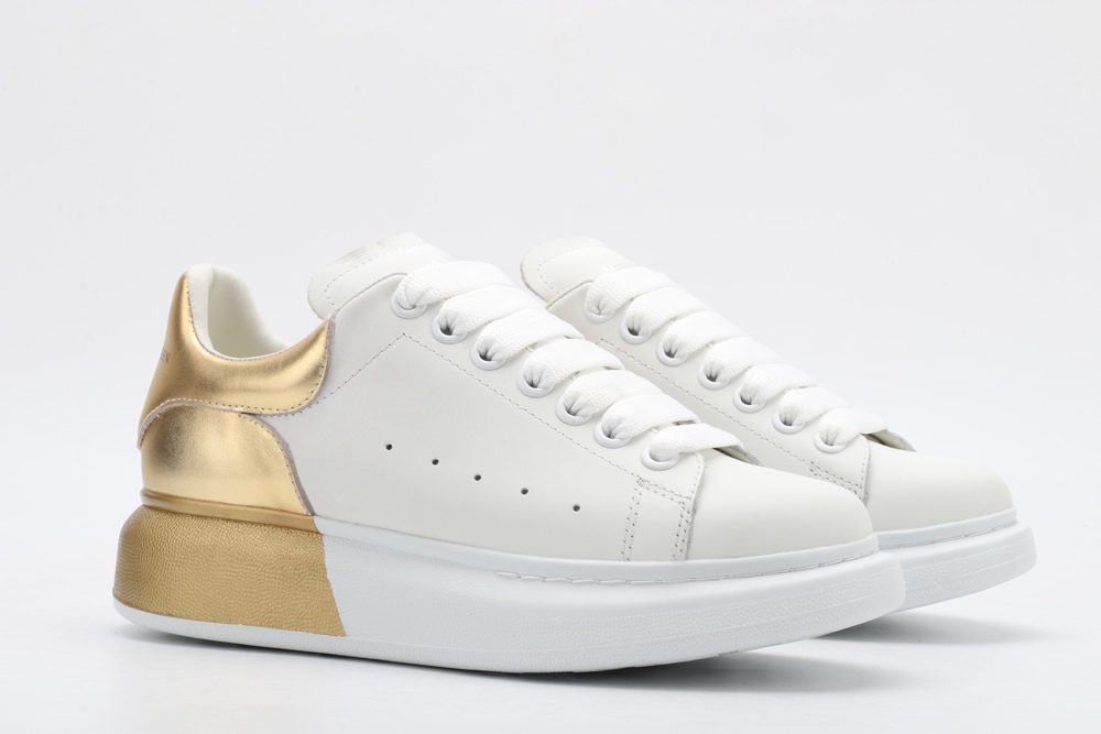 AMQ oversized sneakers with gold heel