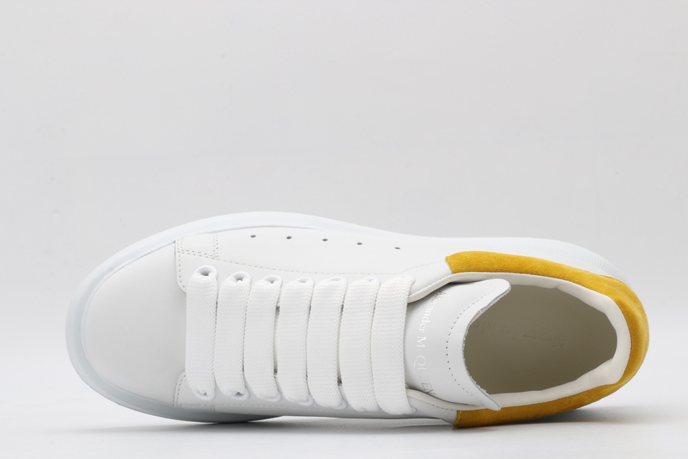 AMQ oversized sneakers with yellow heel