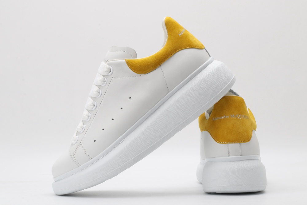 AMQ oversized sneakers with yellow heel