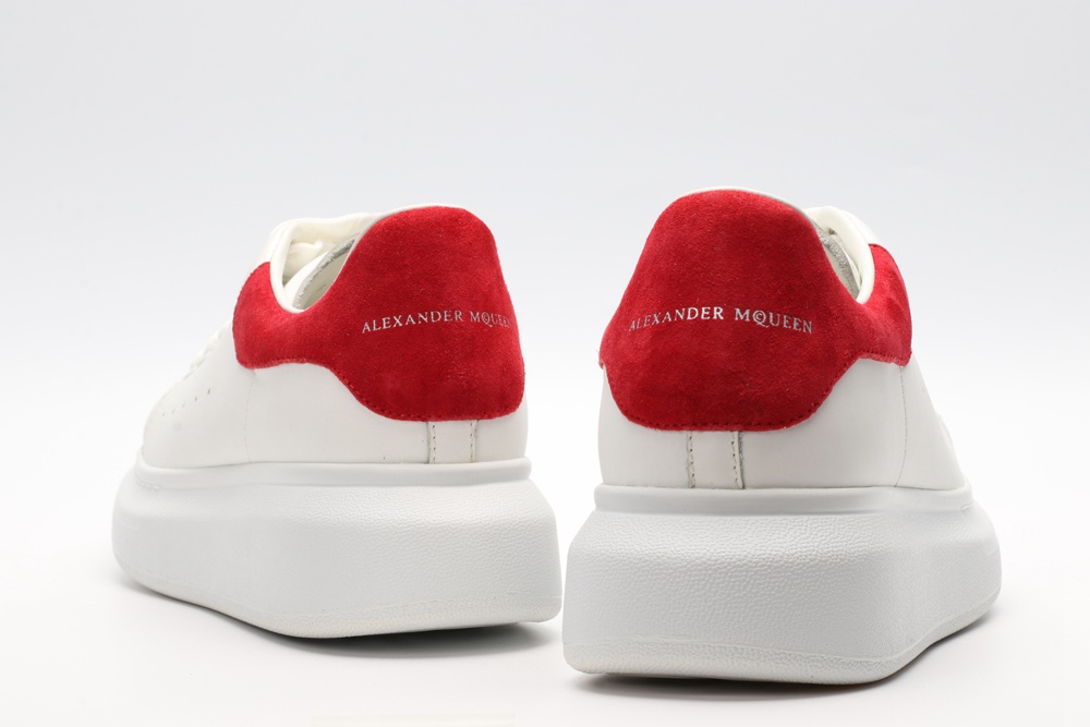 AMQ OVERSIZED SNEAKER with lust red suede heel