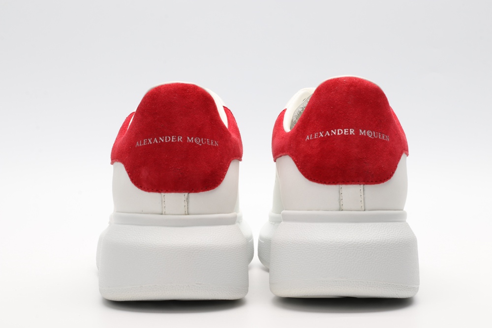 AMQ OVERSIZED SNEAKER with lust red suede heel
