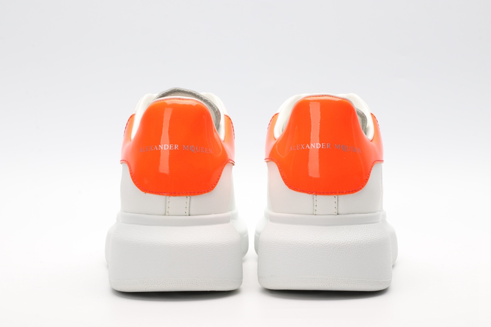 AMQ OVERSIZED SNEAKER with orange heel
