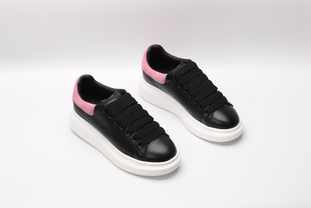 AMQ oversized black sneakers with rose heel