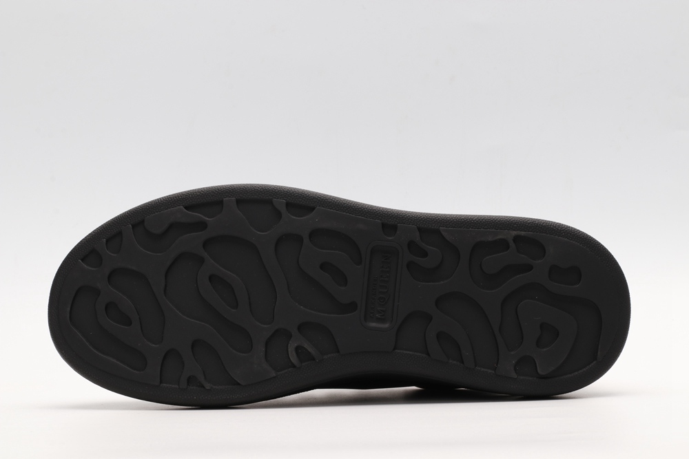 AMQ black oversized sneakers with red heel