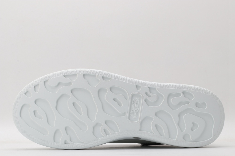 AMQ OVERSIZED SNEAKER with blue stamped python heel