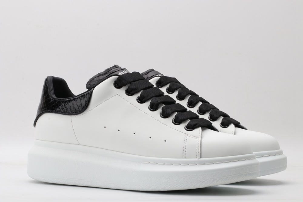 AMQ OVERSIZED SNEAKER with blue stamped python heel