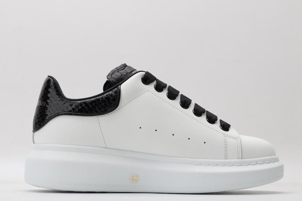 AMQ OVERSIZED SNEAKER with blue stamped python heel