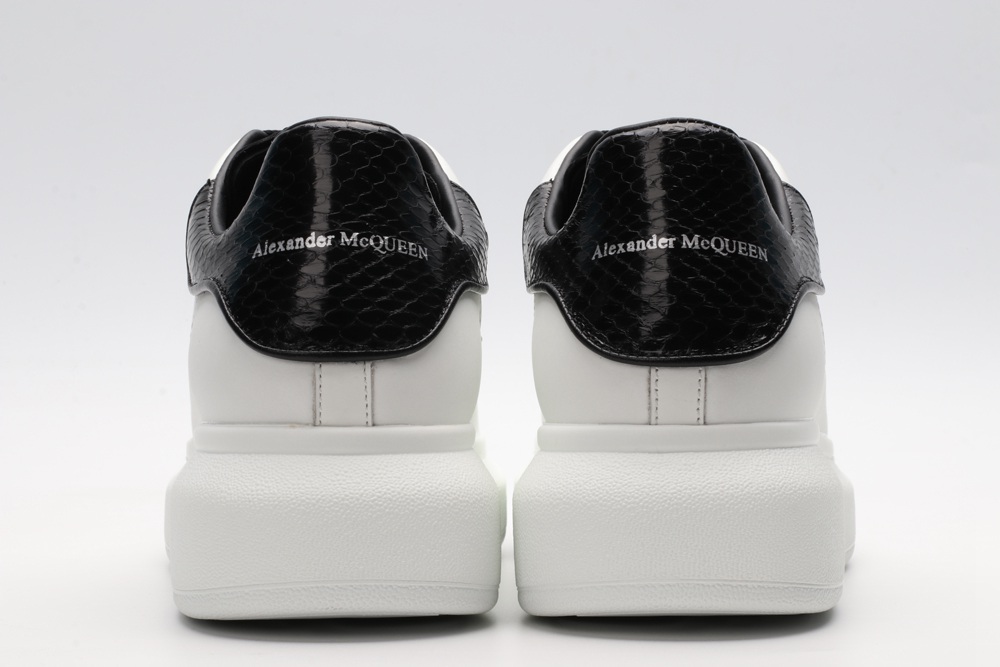 AMQ OVERSIZED SNEAKER with blue stamped python heel