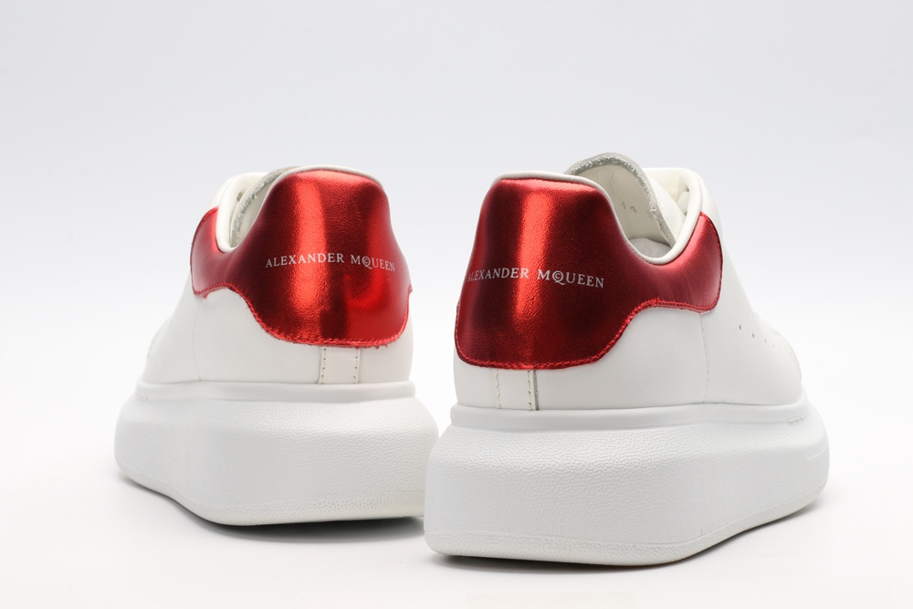 AMQ oversized sneakers with red heel