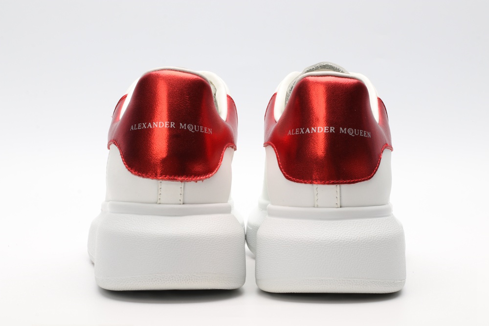 AMQ oversized sneakers with red heel