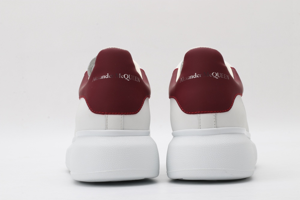 AMQ oversized sneakers with red heel