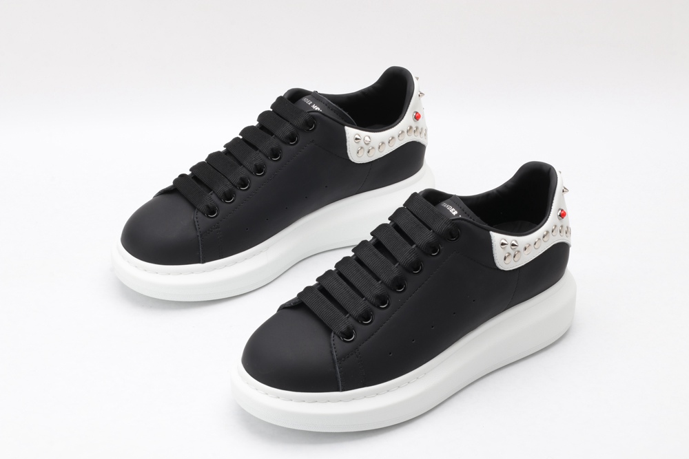 AMQ Black Studded Logo Oversized Sneakers