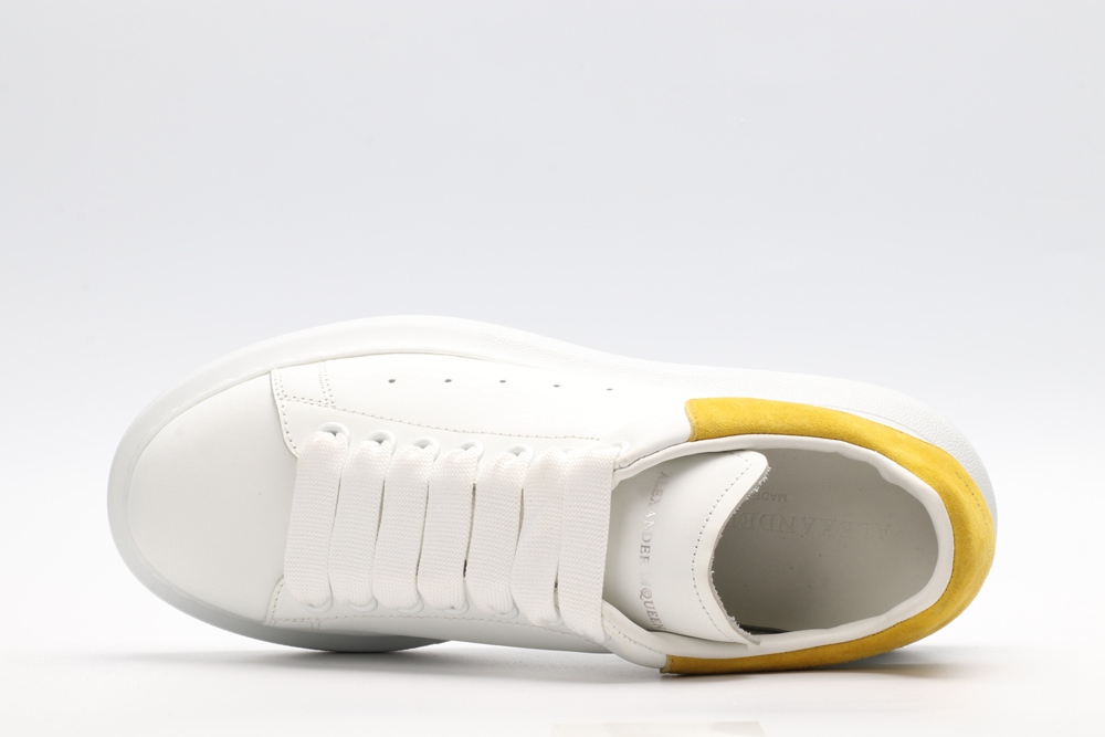 AMQ OVERSIZED SNEAKER Yellow heel