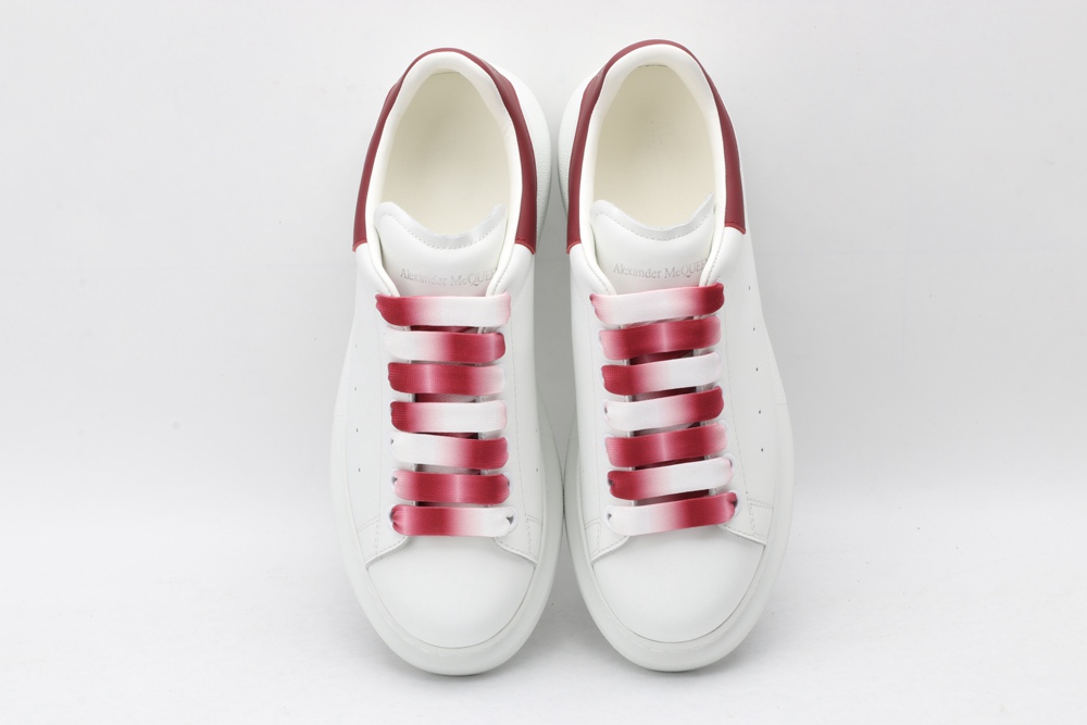 AMQ oversized sneakers with red heel